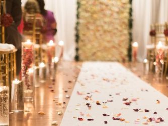 Wedding aisle adorned with flower petals