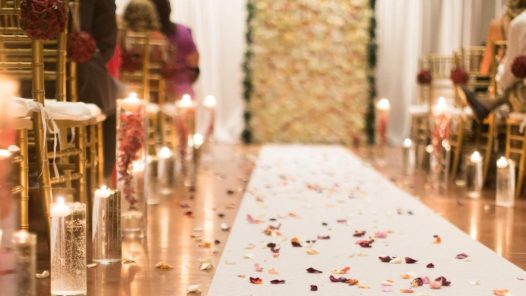 Wedding aisle adorned with flower petals