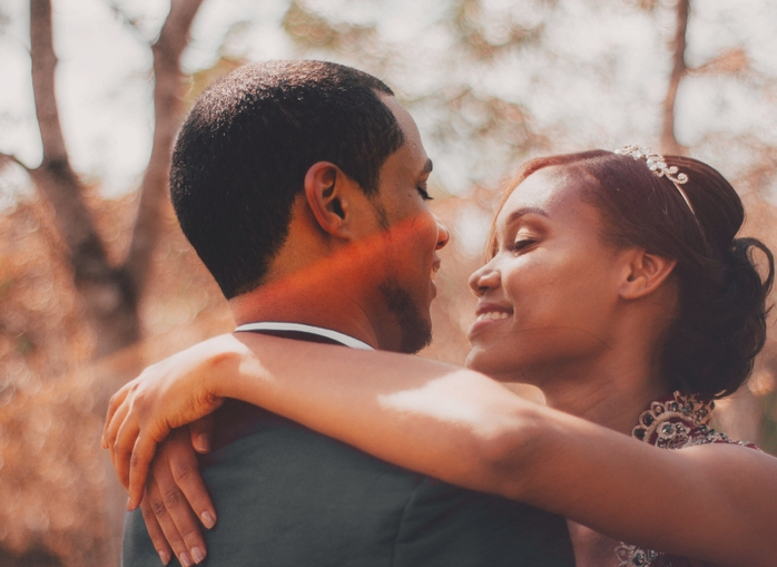 A Black couple embraces