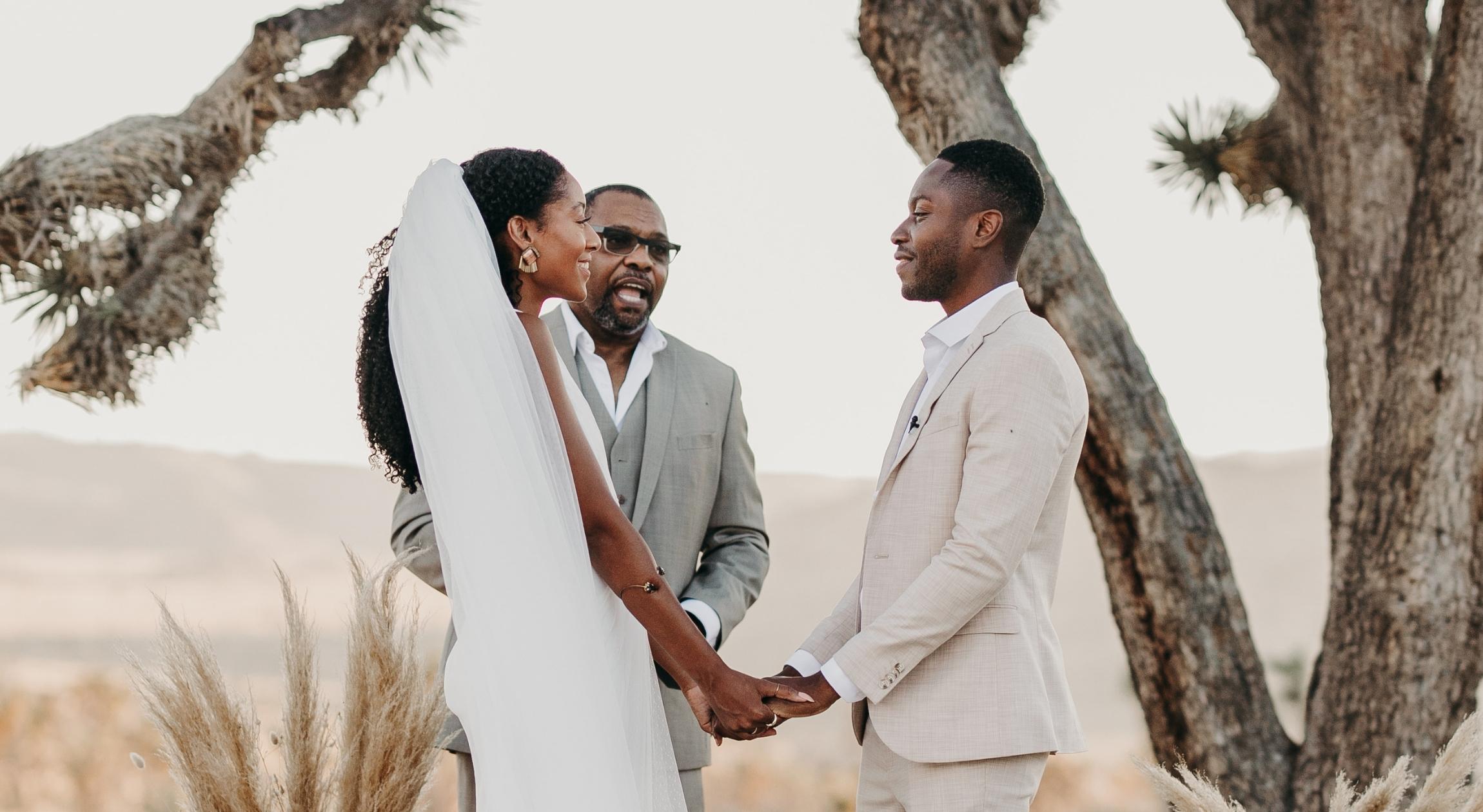 A Black couple gets married in the desert