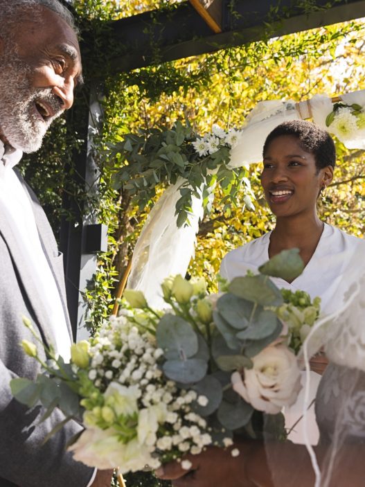 An older Black couple getting married.