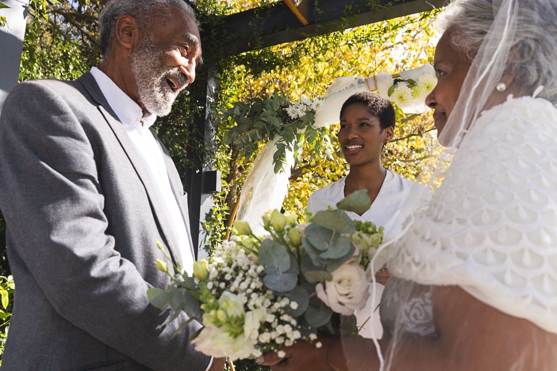 An older Black couple getting married.