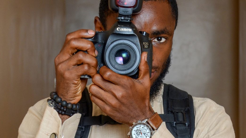 a person taking a picture with their camera