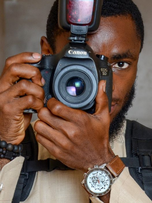 a person taking a picture with their camera