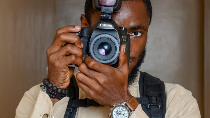 a person taking a picture with their camera